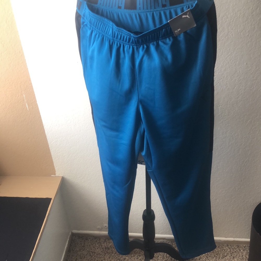 Puma  digi-blue (turquoise)and black slim fit pants.